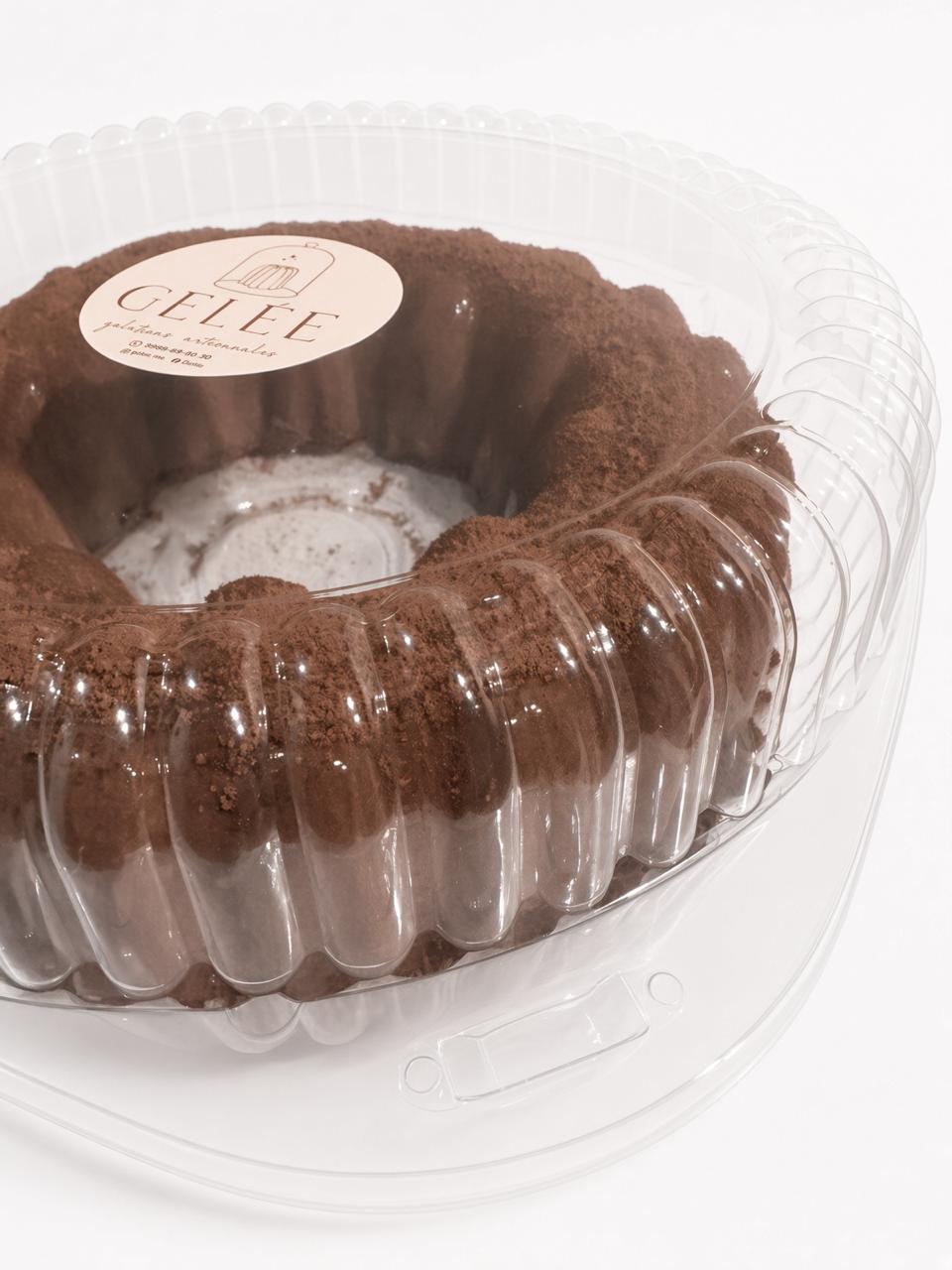 Gelée grande sabor chocolate Abuelita, en forma de rosca espolvoreada con cacao, dentro de su envase redondo